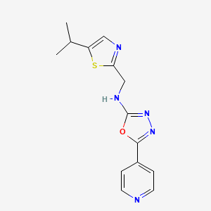 molecular formula C14H15N5OS B7656843 N-[(5-propan-2-yl-1,3-thiazol-2-yl)methyl]-5-pyridin-4-yl-1,3,4-oxadiazol-2-amine 