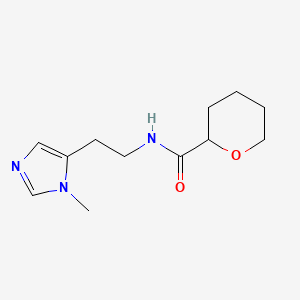 molecular formula C12H19N3O2 B7663034 N-[2-(3-methylimidazol-4-yl)ethyl]oxane-2-carboxamide 