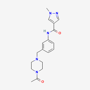 molecular formula C18H23N5O2 B7669491 N-[3-[(4-acetylpiperazin-1-yl)methyl]phenyl]-1-methylpyrazole-4-carboxamide 