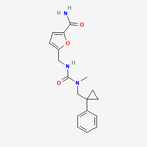 molecular formula C18H21N3O3 B7670272 5-[[[Methyl-[(1-phenylcyclopropyl)methyl]carbamoyl]amino]methyl]furan-2-carboxamide 