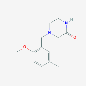 4-[(2-Methoxy-5-methylphenyl)methyl]piperazin-2-one