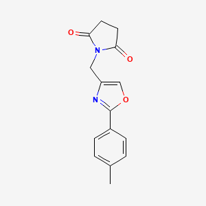 molecular formula C15H14N2O3 B7673570 1-[[2-(4-Methylphenyl)-1,3-oxazol-4-yl]methyl]pyrrolidine-2,5-dione 