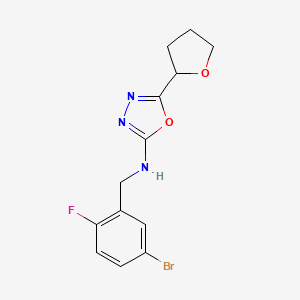 N-[(5-bromo-2-fluorophenyl)methyl]-5-(oxolan-2-yl)-1,3,4-oxadiazol-2-amine