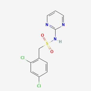 molecular formula C11H9Cl2N3O2S B7679753 1-(2,4-dichlorophenyl)-N-pyrimidin-2-ylmethanesulfonamide 