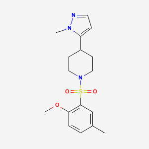 molecular formula C17H23N3O3S B7679765 1-(2-Methoxy-5-methylphenyl)sulfonyl-4-(2-methylpyrazol-3-yl)piperidine 