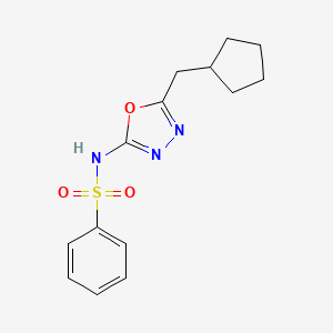 molecular formula C14H17N3O3S B7679898 N-[5-(cyclopentylmethyl)-1,3,4-oxadiazol-2-yl]benzenesulfonamide 