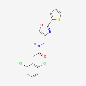 molecular formula C16H12Cl2N2O2S B7680625 2-(2,6-dichlorophenyl)-N-[(2-thiophen-2-yl-1,3-oxazol-4-yl)methyl]acetamide 