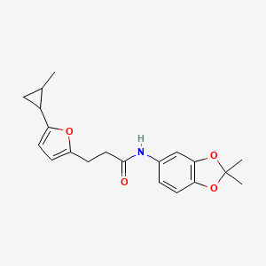 molecular formula C20H23NO4 B7681671 N-(2,2-dimethyl-1,3-benzodioxol-5-yl)-3-[5-(2-methylcyclopropyl)furan-2-yl]propanamide 