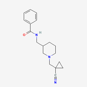 molecular formula C18H23N3O B7682029 N-[[1-[(1-cyanocyclopropyl)methyl]piperidin-3-yl]methyl]benzamide 