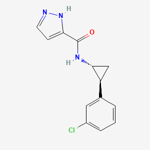 molecular formula C13H12ClN3O B7683351 N-[(1R,2S)-2-(3-chlorophenyl)cyclopropyl]-1H-pyrazole-5-carboxamide 