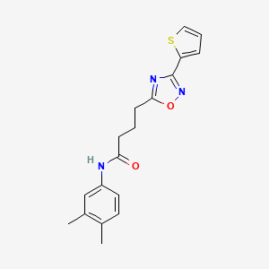 N-(3,4-dimethylphenyl)-4-[3-(thiophen-2-yl)-1,2,4-oxadiazol-5-yl]butanamide