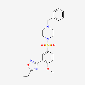 molecular formula C22H26N4O4S B7686155 3-(5-((4-benzylpiperazin-1-yl)sulfonyl)-2-methoxyphenyl)-5-ethyl-1,2,4-oxadiazole 