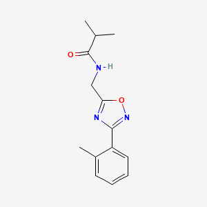 molecular formula C14H17N3O2 B7686800 N-((3-(o-tolyl)-1,2,4-oxadiazol-5-yl)methyl)isobutyramide 
