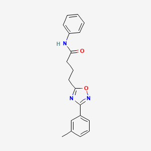 molecular formula C19H19N3O2 B7688957 N-phenyl-4-(3-(m-tolyl)-1,2,4-oxadiazol-5-yl)butanamide 