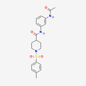 molecular formula C21H25N3O4S B7691943 N-(3-acetamidophenyl)-1-tosylpiperidine-4-carboxamide 