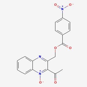 molecular formula C18H13N3O6 B7694429 2-acetyl-3-(((4-nitrobenzoyl)oxy)methyl)quinoxaline 1-oxide 