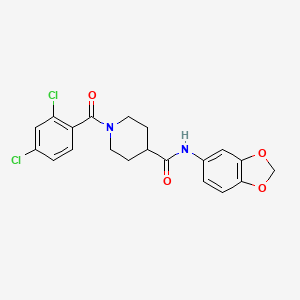 molecular formula C20H18Cl2N2O4 B7699255 N-(benzo[d][1,3]dioxol-5-yl)-1-(2,4-dichlorobenzoyl)piperidine-4-carboxamide 