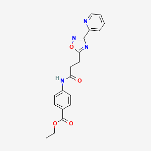 molecular formula C19H18N4O4 B7700365 ethyl 4-(3-(3-(pyridin-2-yl)-1,2,4-oxadiazol-5-yl)propanamido)benzoate 