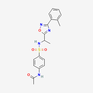 molecular formula C19H20N4O4S B7704502 N-(4-(N-(1-(3-(o-tolyl)-1,2,4-oxadiazol-5-yl)ethyl)sulfamoyl)phenyl)acetamide 