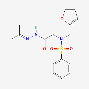 molecular formula C16H19N3O4S B7709895 N-(furan-2-ylmethyl)-N-(2-oxo-2-(2-(propan-2-ylidene)hydrazinyl)ethyl)benzenesulfonamide 