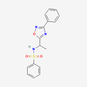 molecular formula C16H15N3O3S B7713897 N-(1-(3-phenyl-1,2,4-oxadiazol-5-yl)ethyl)benzenesulfonamide 