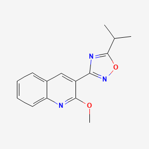 molecular formula C15H15N3O2 B7714810 5-isopropyl-3-(2-methoxyquinolin-3-yl)-1,2,4-oxadiazole 