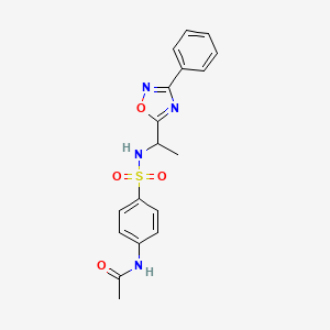 molecular formula C18H18N4O4S B7715490 N-(4-(N-(1-(3-phenyl-1,2,4-oxadiazol-5-yl)ethyl)sulfamoyl)phenyl)acetamide 