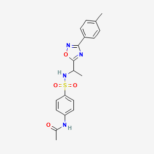 molecular formula C19H20N4O4S B7715546 N-(4-(N-(1-(3-(p-tolyl)-1,2,4-oxadiazol-5-yl)ethyl)sulfamoyl)phenyl)acetamide 