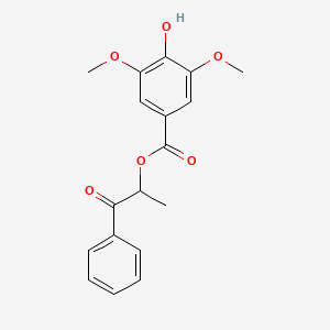 molecular formula C18H18O6 B7734524 1-Oxo-1-phenylpropan-2-yl 4-hydroxy-3,5-dimethoxybenzoate 