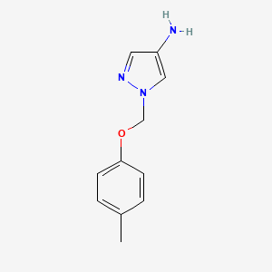 molecular formula C11H13N3O B7761781 1-[(4-methylphenoxy)methyl]-1H-pyrazol-4-amine 