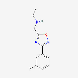 molecular formula C12H15N3O B7773926 N-((3-(m-tolyl)-1,2,4-oxadiazol-5-yl)methyl)ethanamine 