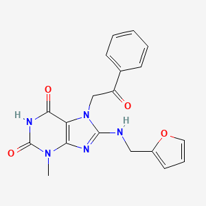 molecular formula C19H17N5O4 B7783756 8-[(furan-2-ylmethyl)amino]-6-hydroxy-3-methyl-7-(2-oxo-2-phenylethyl)-3,7-dihydro-2H-purin-2-one 