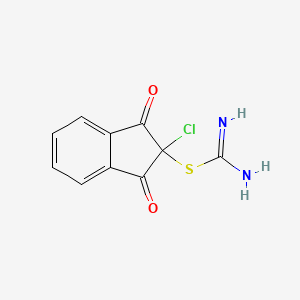 molecular formula C10H7ClN2O2S B7785594 2-{[Amino(imino)methyl]sulfanyl}-2-chloro-1,3-dioxoindane 