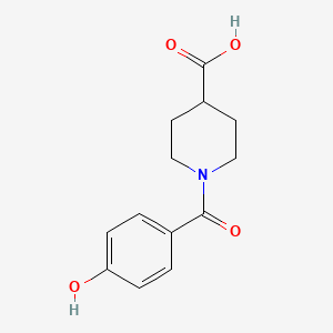 molecular formula C13H15NO4 B7807220 1-(4-Hydroxybenzoyl)piperidine-4-carboxylic acid 