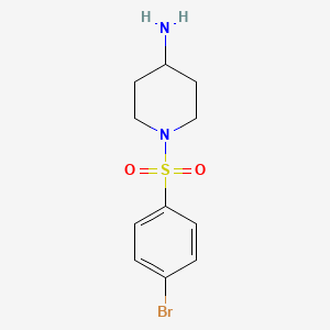 molecular formula C11H15BrN2O2S B7808784 1-[(4-Bromophenyl)sulfonyl]piperidin-4-amine CAS No. 883106-50-1