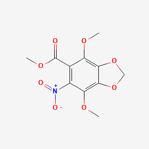 molecular formula C11H11NO8 B7816863 Methyl 4,7-dimethoxy-6-nitro-1,3-benzodioxole-5-carboxylate 