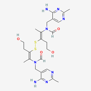 molecular formula C24H34N8O4S2 B7824904 N-[(4-amino-2-methylpyrimidin-5-yl)methyl]-N-[(Z)-3-[[(E)-2-[(4-amino-2-methylpyrimidin-5-yl)methyl-formylamino]-5-hydroxypent-2-en-3-yl]disulfanyl]-5-hydroxypent-2-en-2-yl]formamide 