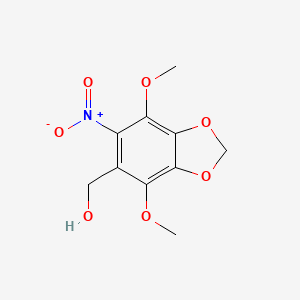 molecular formula C10H11NO7 B7829232 (4,7-Dimethoxy-6-nitro-1,3-benzodioxol-5-yl)methanol 