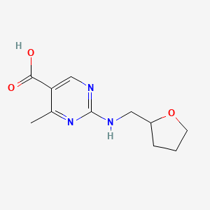 molecular formula C11H15N3O3 B7836224 4-Methyl-2-[(tetrahydrofuran-2-ylmethyl)amino]pyrimidine-5-carboxylic acid 