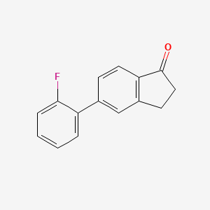 molecular formula C15H11FO B7837610 5-(2-Fluorophenyl)-2,3-dihydro-1H-inden-1-one 