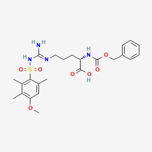 molecular formula C24H32N4O7S B7840640 (2S)-2-{[(benzyloxy)carbonyl]amino}-5-[N'-(4-methoxy-2,3,6-trimethylbenzenesulfonyl)carbamimidamido]pentanoic acid 
