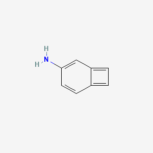 molecular formula C8H7N B7853450 Bicyclo[4.2.0]octa-1,3,5,7-tetraen-3-amine CAS No. 113443-96-2