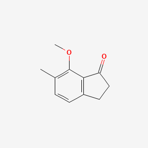 molecular formula C11H12O2 B7856316 7-methoxy-6-methyl-2,3-dihydro-1H-inden-1-one 