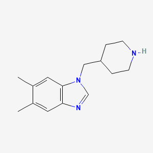 molecular formula C15H21N3 B7856582 5,6-Dimethyl-1-(piperidin-4-ylmethyl)benzimidazole 