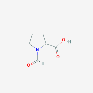 molecular formula C6H9NO3 B7864259 1-Formylpyrrolidine-2-carboxylic acid 