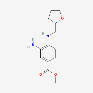 molecular formula C13H18N2O3 B7866083 Methyl 3-amino-4-[(oxolan-2-ylmethyl)amino]benzoate 