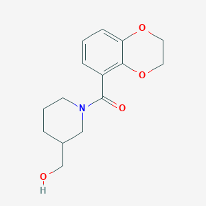 molecular formula C15H19NO4 B7869933 (2,3-Dihydrobenzo[b][1,4]dioxin-5-yl)(3-(hydroxymethyl)piperidin-1-yl)methanone 