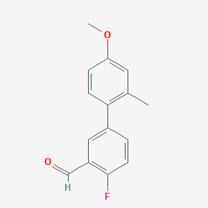 molecular formula C15H13FO2 B7870935 2-Fluoro-5-(4-methoxy-2-methylphenyl)benzaldehyde 
