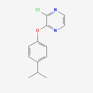 molecular formula C13H13ClN2O B7872973 2-Chloro-3-(4-isopropylphenoxy)pyrazine 