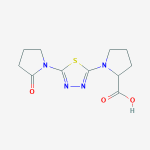 molecular formula C11H14N4O3S B7875900 1-[5-(2-Oxo-1-pyrrolidinyl)-1,3,4-thiadiazol-2-yl]-2-pyrrolidinecarboxylic acid 